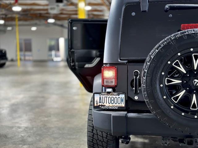 used 2013 Jeep Wrangler Unlimited car, priced at $21,995