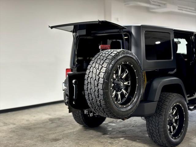 used 2013 Jeep Wrangler Unlimited car, priced at $21,995