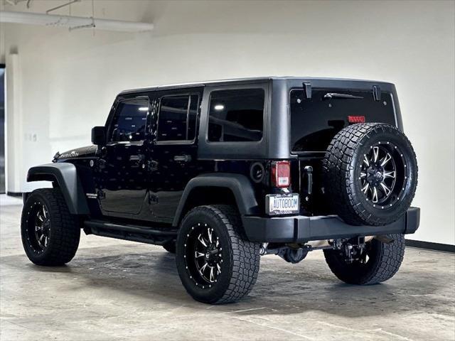 used 2013 Jeep Wrangler Unlimited car, priced at $21,995