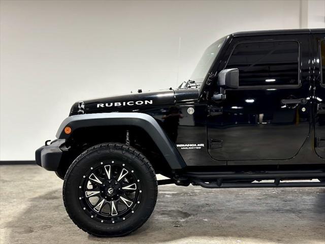 used 2013 Jeep Wrangler Unlimited car, priced at $21,995