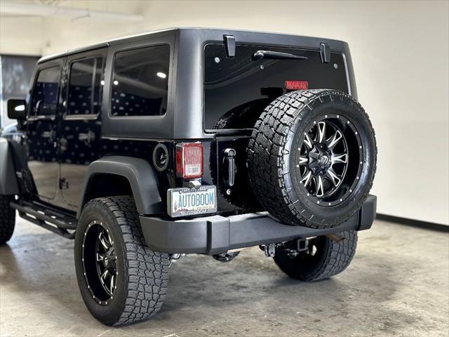 used 2013 Jeep Wrangler Unlimited car, priced at $21,995