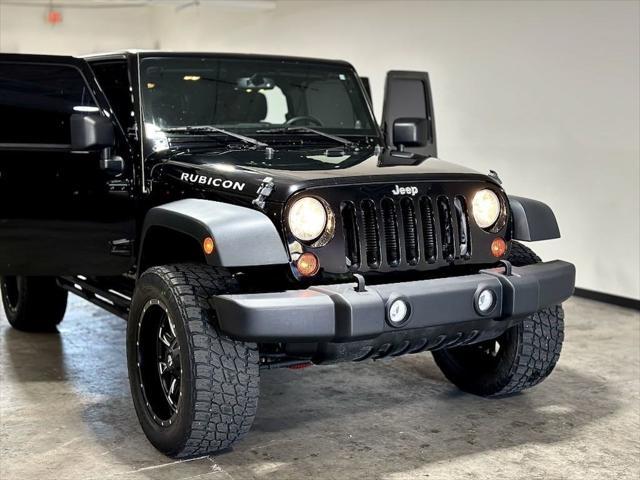 used 2013 Jeep Wrangler Unlimited car, priced at $21,995