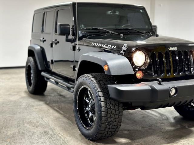 used 2013 Jeep Wrangler Unlimited car, priced at $21,995