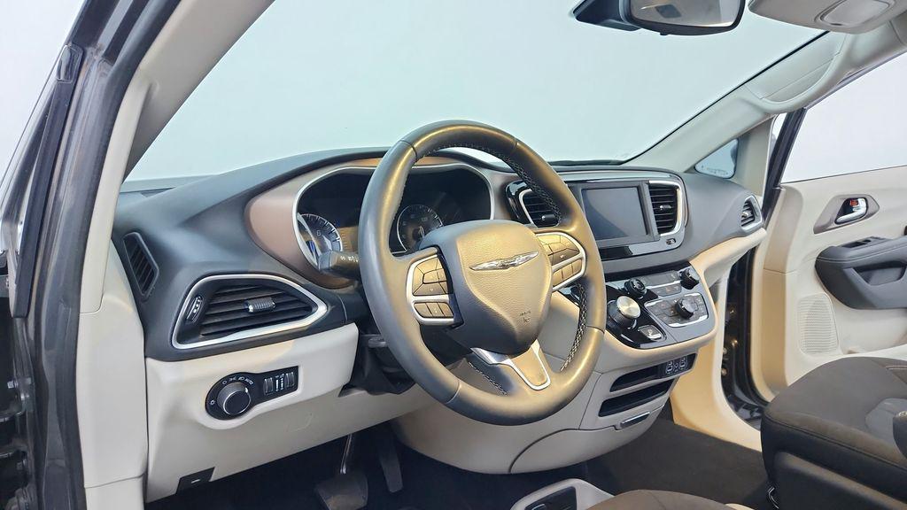 used 2023 Chrysler Voyager car, priced at $22,991