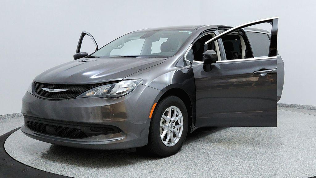 used 2023 Chrysler Voyager car, priced at $22,991