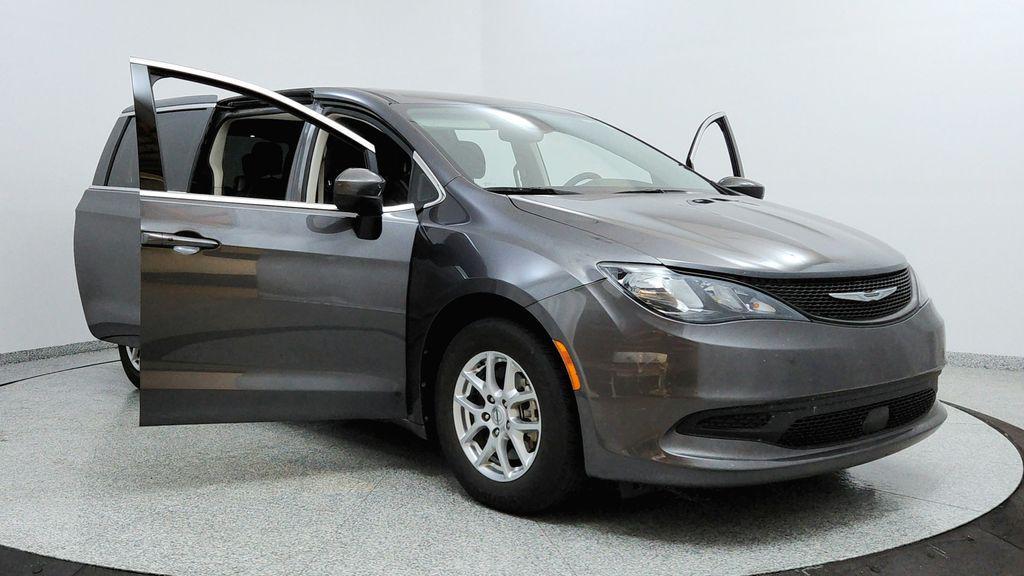 used 2023 Chrysler Voyager car, priced at $22,991
