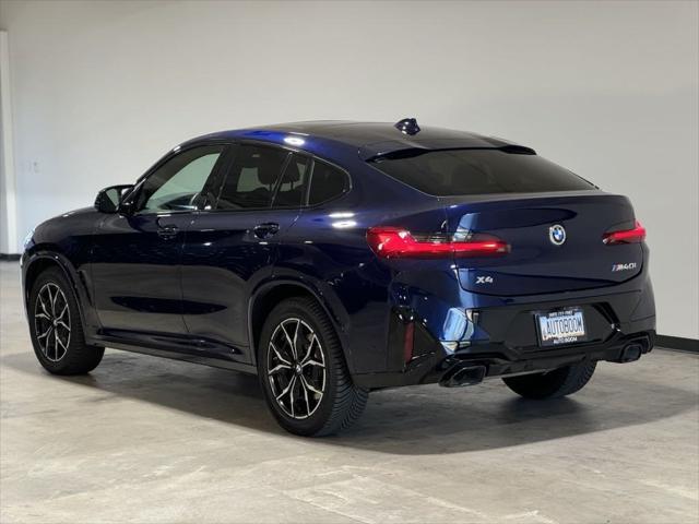 used 2022 BMW X4 car, priced at $49,995