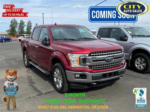 used 2018 Ford F-150 car, priced at $27,823