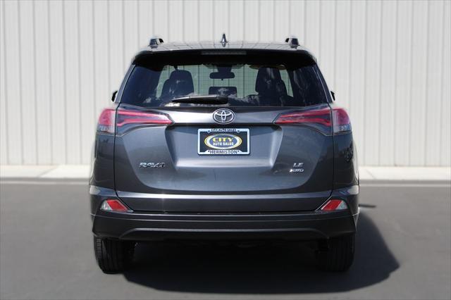 used 2018 Toyota RAV4 car, priced at $22,131