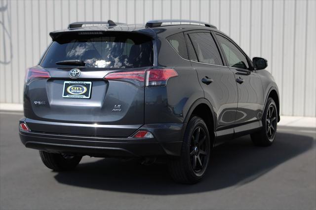 used 2018 Toyota RAV4 car, priced at $22,131