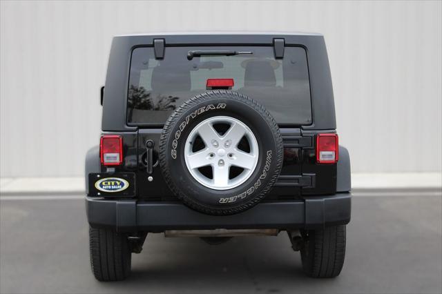 used 2014 Jeep Wrangler car, priced at $16,402