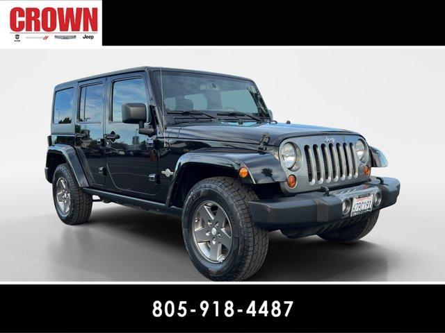 used 2013 Jeep Wrangler Unlimited car, priced at $15,991