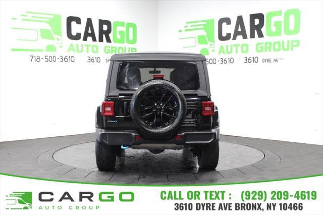 used 2023 Jeep Wrangler 4xe car, priced at $35,995