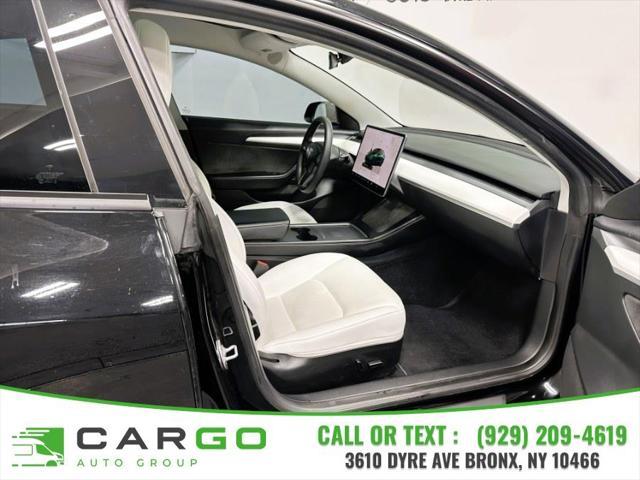 used 2023 Tesla Model 3 car, priced at $27,995