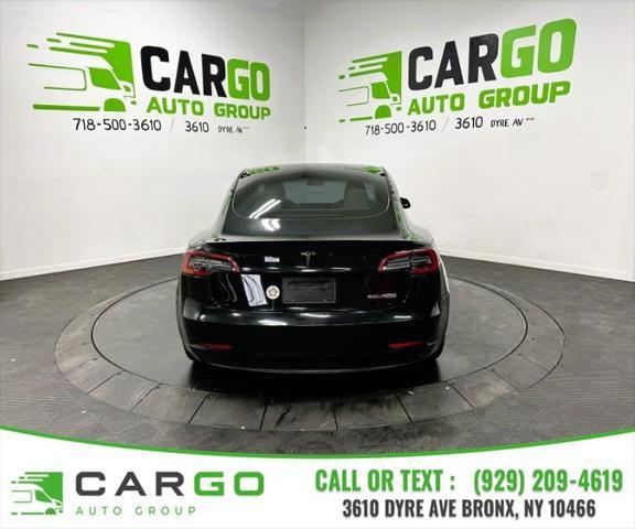 used 2023 Tesla Model 3 car, priced at $27,995
