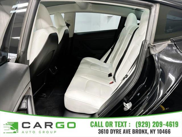 used 2023 Tesla Model 3 car, priced at $27,995