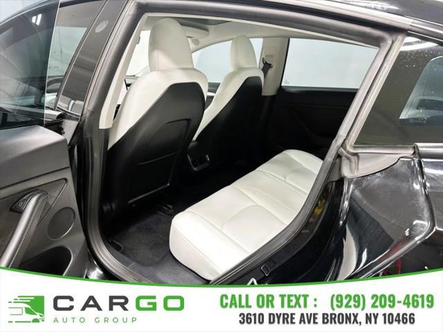 used 2023 Tesla Model 3 car, priced at $27,995
