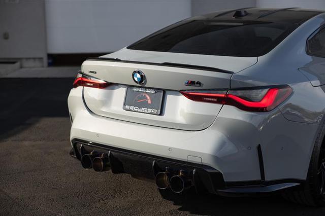 used 2024 BMW M4 car, priced at $86,995