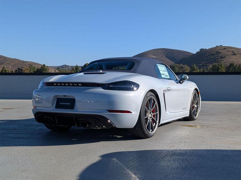 new 2025 Porsche 718 Boxster car, priced at $140,025