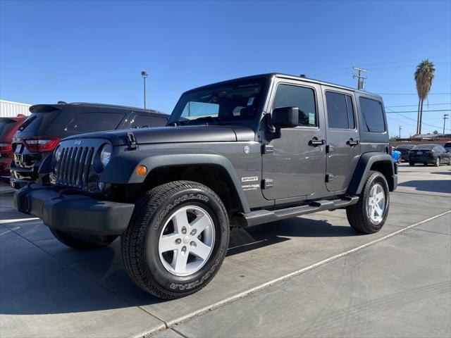 used 2018 Jeep Wrangler JK Unlimited car, priced at $27,076