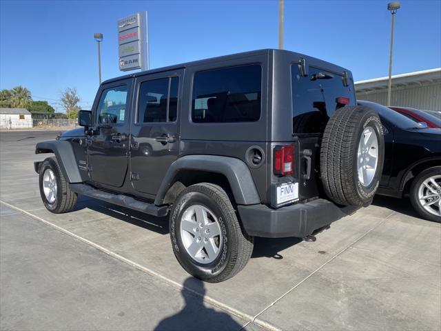 used 2018 Jeep Wrangler JK Unlimited car, priced at $26,994