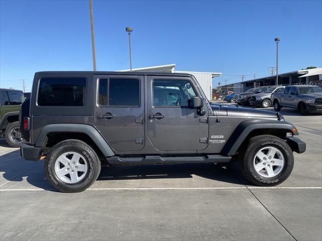 used 2018 Jeep Wrangler JK Unlimited car, priced at $26,994