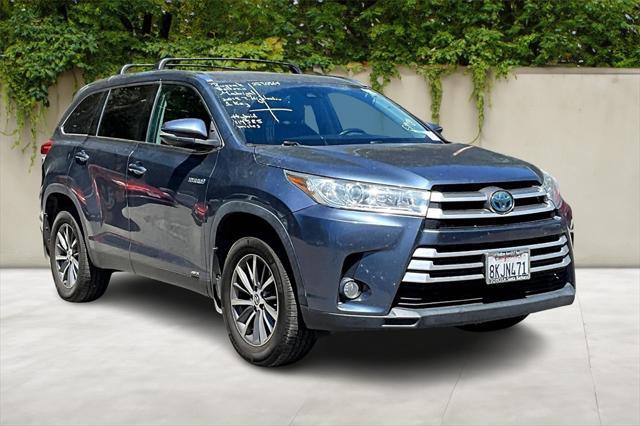 used 2019 Toyota Highlander Hybrid car, priced at $25,979