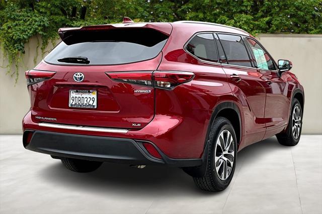 used 2022 Toyota Highlander Hybrid car, priced at $40,979