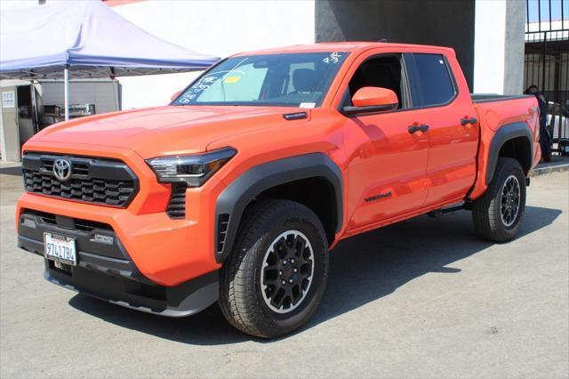 used 2024 Toyota Tacoma car, priced at $48,989
