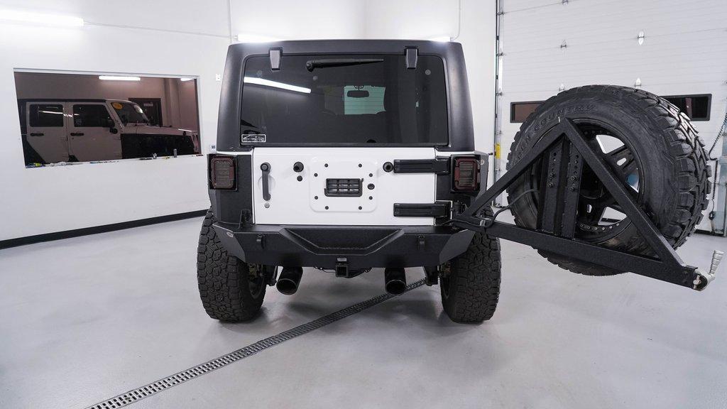 used 2015 Jeep Wrangler Unlimited car, priced at $21,488