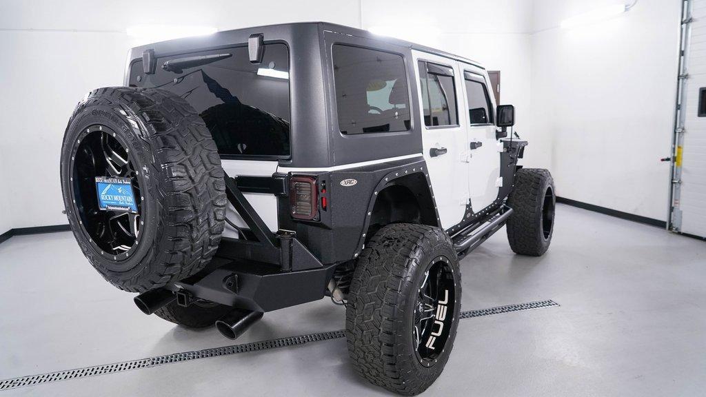 used 2015 Jeep Wrangler Unlimited car, priced at $21,488