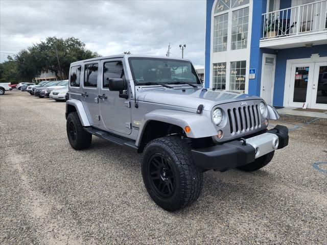 used 2015 Jeep Wrangler Unlimited car, priced at $21,995