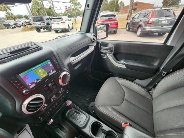 used 2015 Jeep Wrangler Unlimited car, priced at $21,995