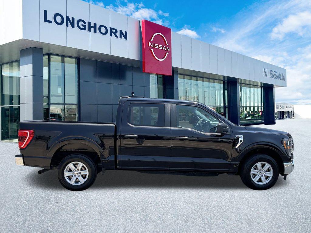 used 2023 Ford F-150 car, priced at $28,400