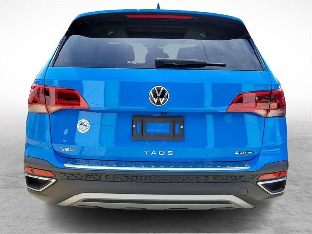 used 2023 Volkswagen Taos car, priced at $27,606