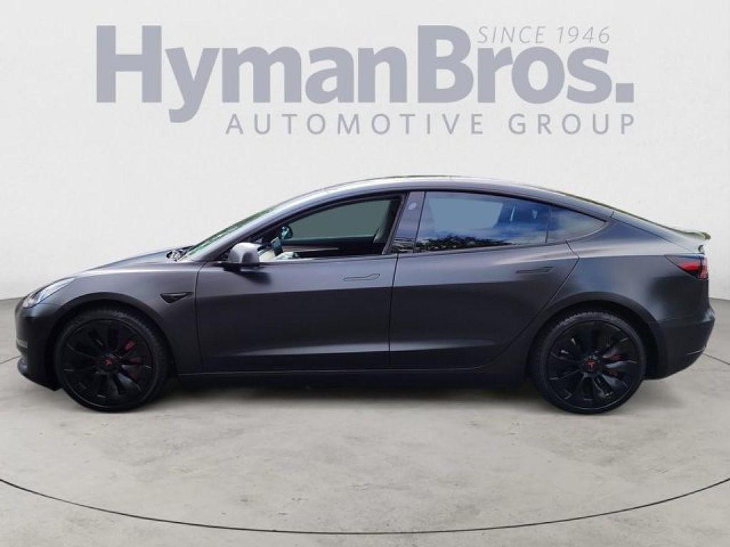 used 2023 Tesla Model 3 car, priced at $28,495