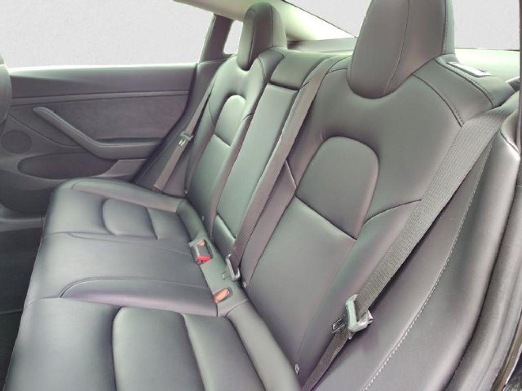 used 2023 Tesla Model 3 car, priced at $28,495