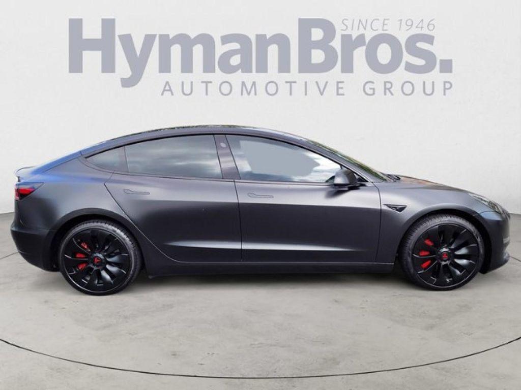used 2023 Tesla Model 3 car, priced at $28,495