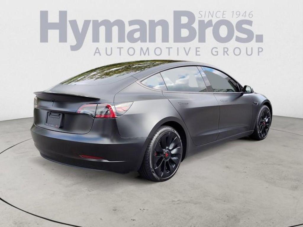 used 2023 Tesla Model 3 car, priced at $28,495