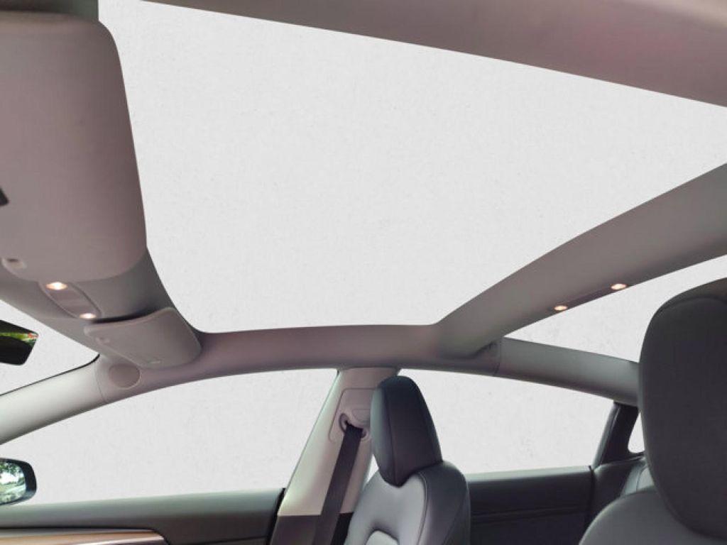 used 2023 Tesla Model 3 car, priced at $28,495