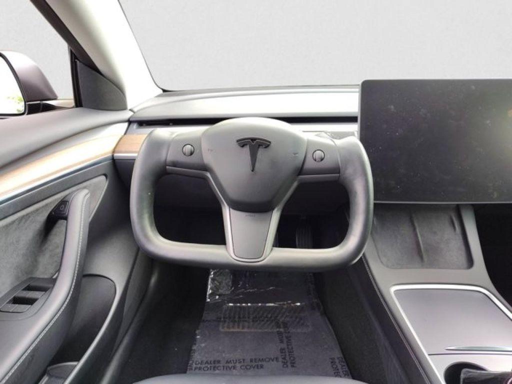 used 2023 Tesla Model 3 car, priced at $28,495