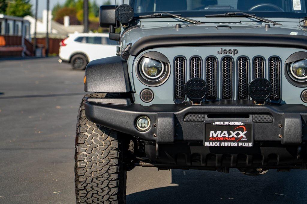 used 2014 Jeep Wrangler Unlimited car, priced at $21,697