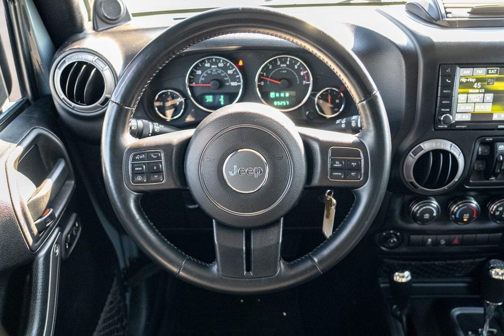 used 2014 Jeep Wrangler Unlimited car, priced at $21,697