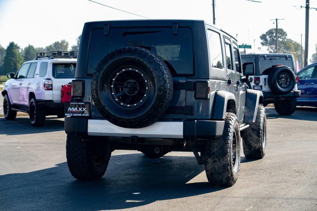 used 2014 Jeep Wrangler Unlimited car, priced at $21,697