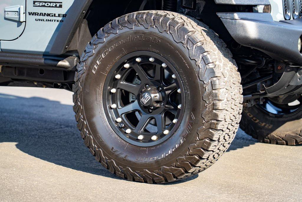 used 2014 Jeep Wrangler Unlimited car, priced at $21,697