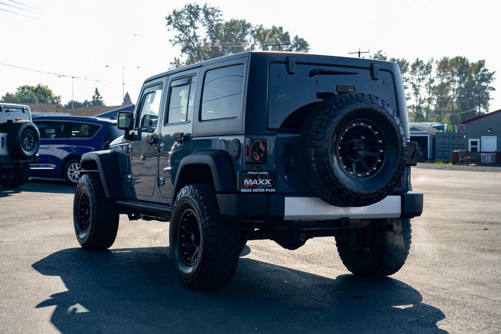 used 2014 Jeep Wrangler Unlimited car, priced at $21,697