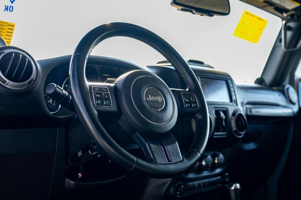 used 2014 Jeep Wrangler Unlimited car, priced at $21,697