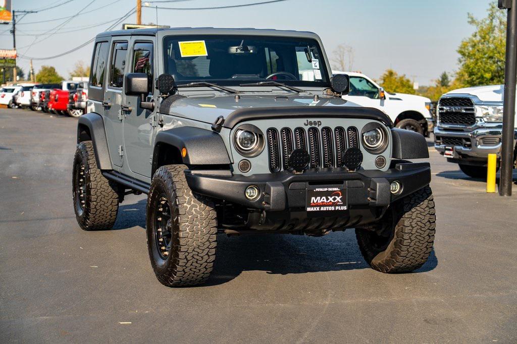 used 2014 Jeep Wrangler Unlimited car, priced at $21,697