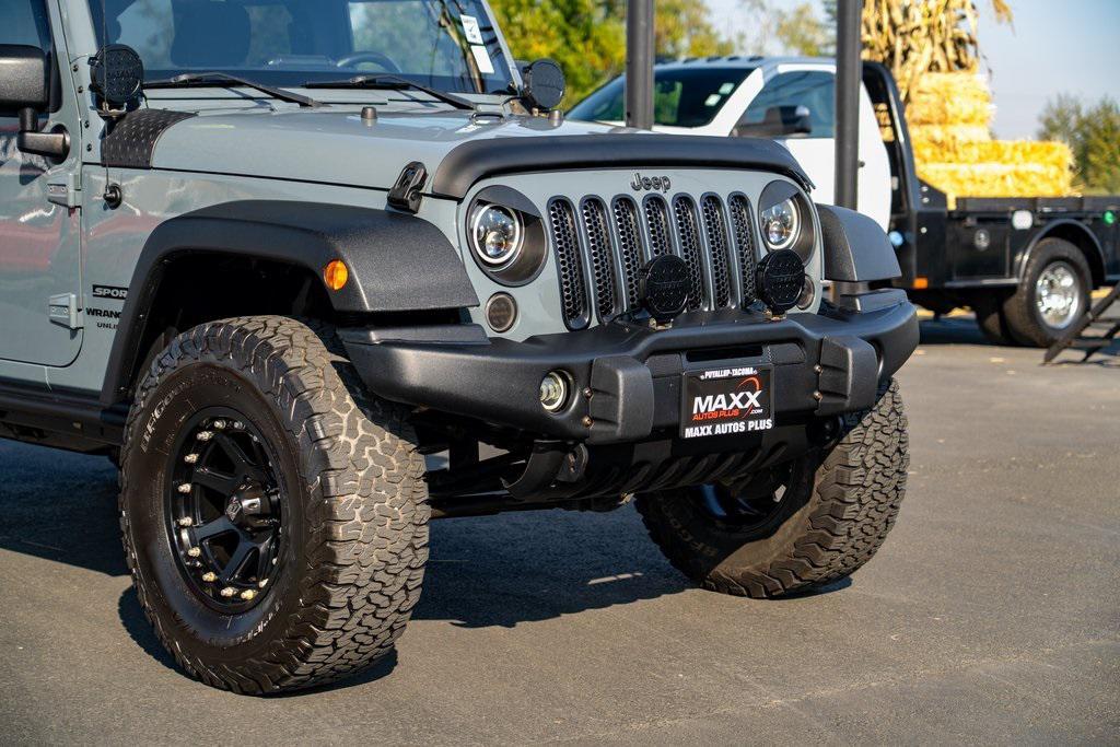 used 2014 Jeep Wrangler Unlimited car, priced at $21,697
