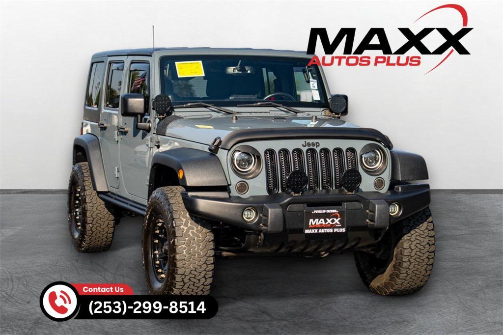 used 2014 Jeep Wrangler Unlimited car, priced at $21,697